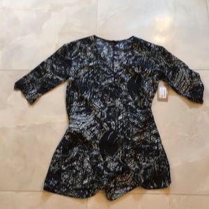 Closet staple. Black and white romper.